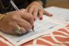 A citizen completing a form during a test session for the upcoming 2020 census. Photo courtesy of U.S. Census Bureau